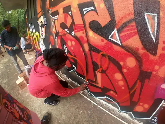 wicked broz artist creating beautiful art for the bombway fest15